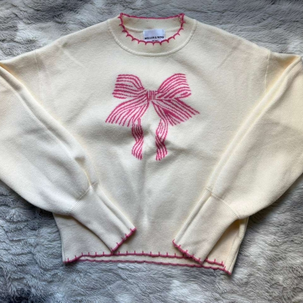 Cream Sweater with Pink Bow Design